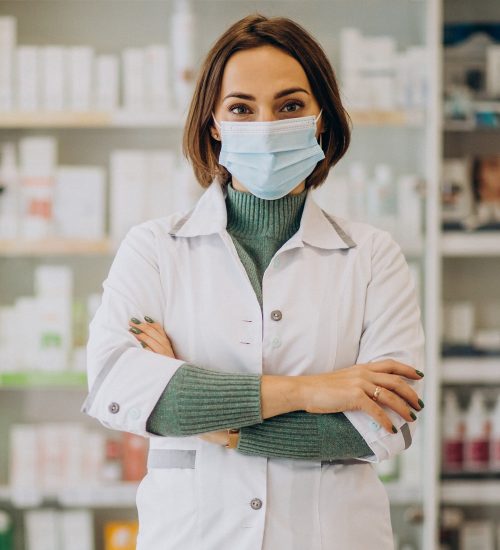 Young woman pharmacist at pharmacy